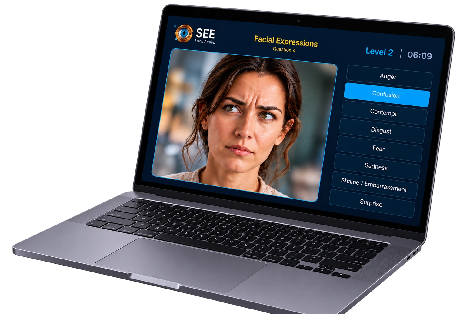 SEE facial expressions game displayed on a laptop